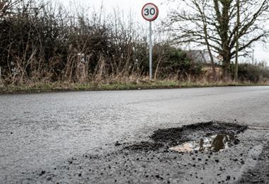 Pothole, road